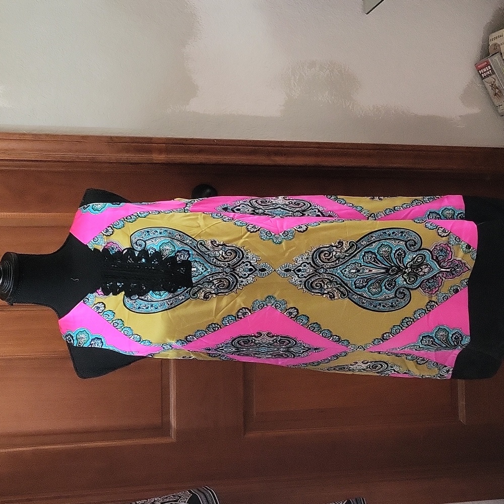 Multi colored silky dress with black lace on front of dress.